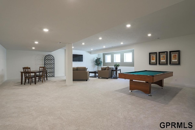 rec room with pool table and light carpet