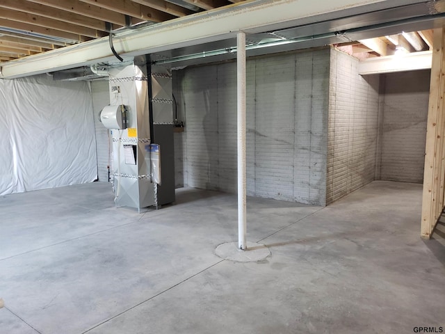 basement featuring heating unit