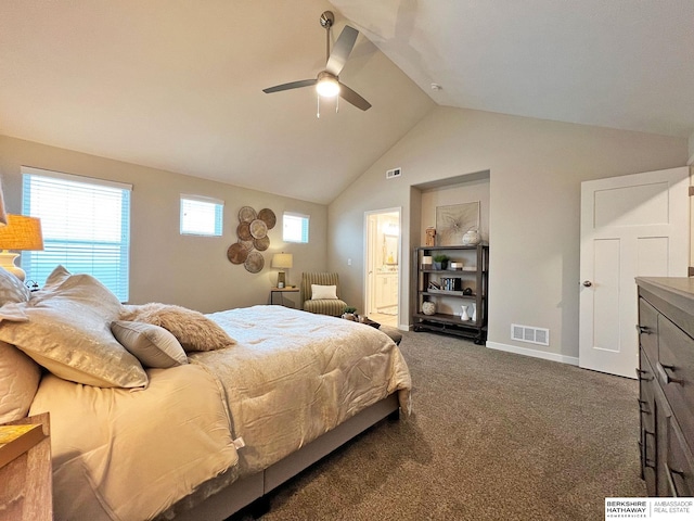 bedroom with dark colored carpet, ceiling fan, and lofted ceiling