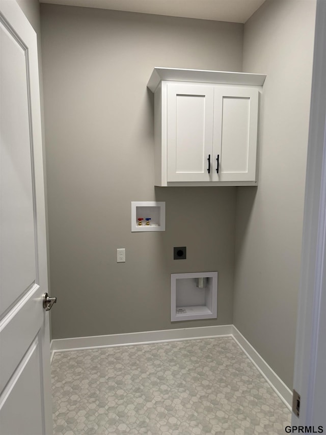 washroom featuring cabinets, hookup for a washing machine, and electric dryer hookup