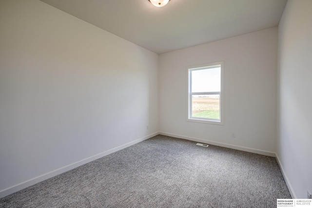 view of carpeted spare room