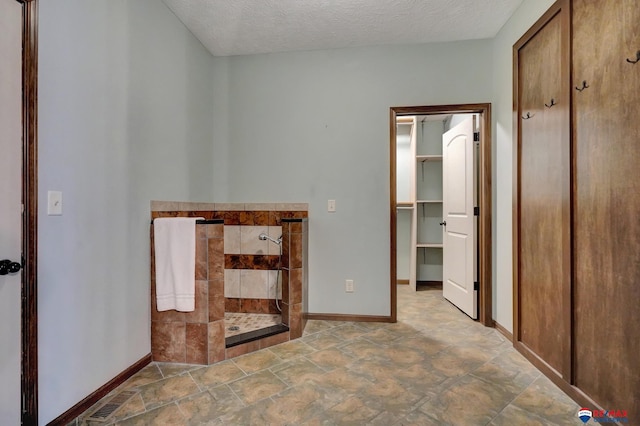 interior space with a textured ceiling