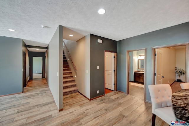 interior space featuring a textured ceiling