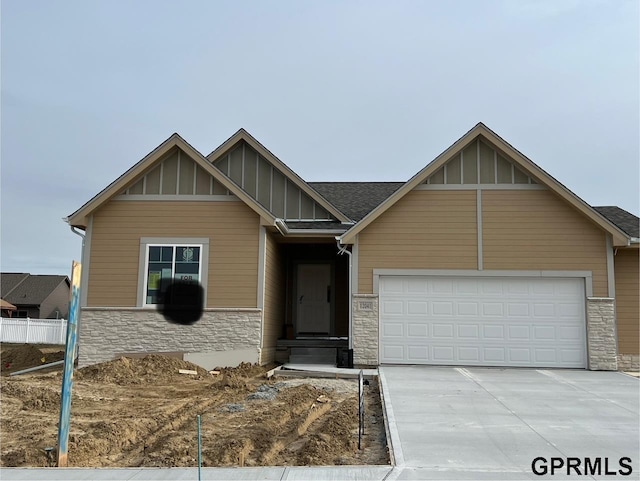 view of front of property with a garage