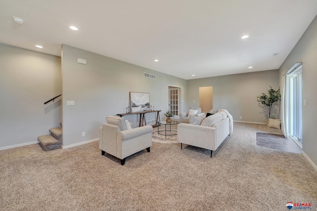 living room featuring light colored carpet