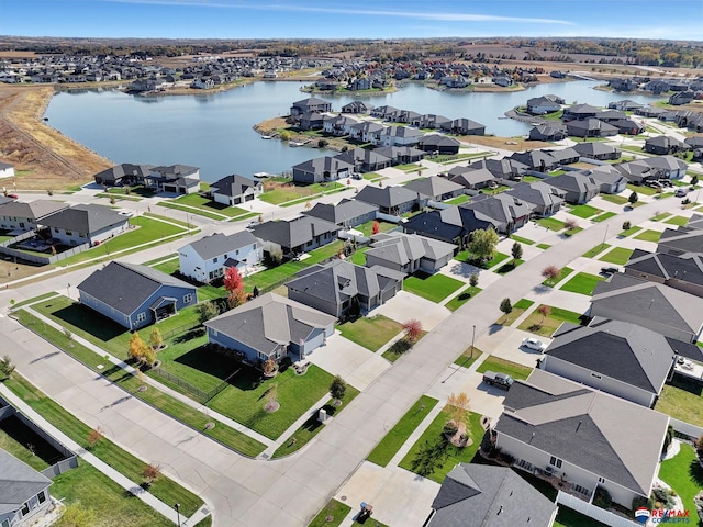 drone / aerial view with a water view