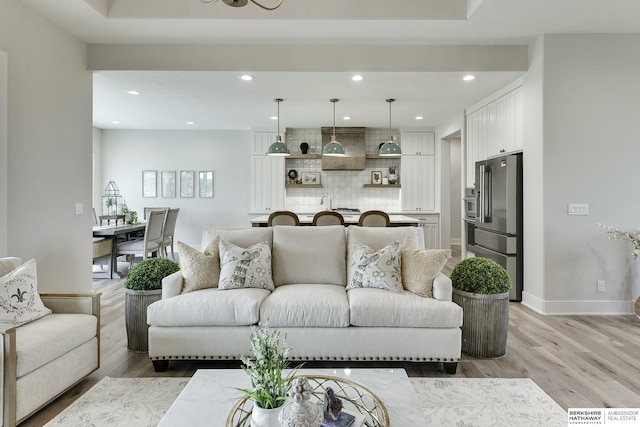 living room with light hardwood / wood-style floors