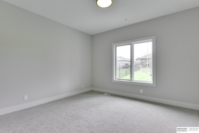 spare room with carpet flooring