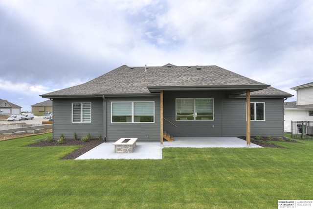 rear view of property with a patio area and a yard