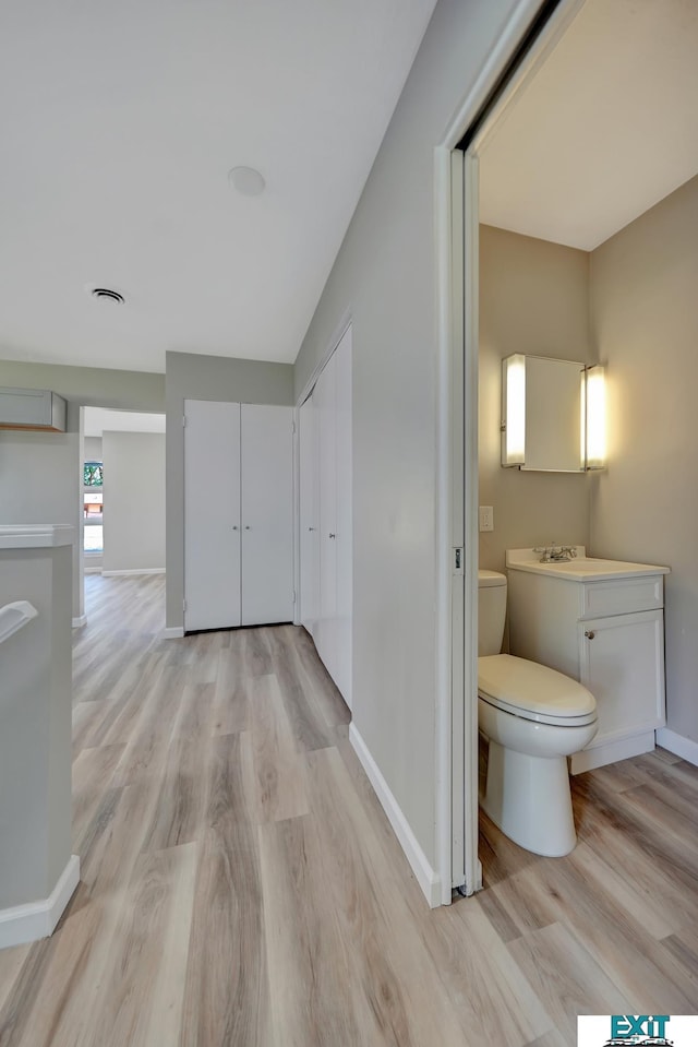 hall featuring light hardwood / wood-style flooring