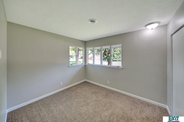 view of carpeted spare room