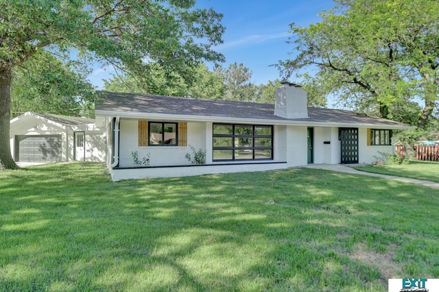 view of front of home with a front yard