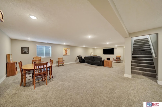 dining space with light carpet