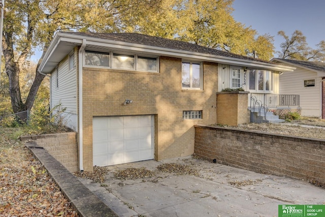 view of front of property with a garage