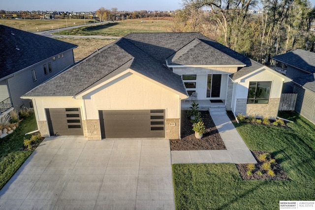 view of front of property featuring a garage