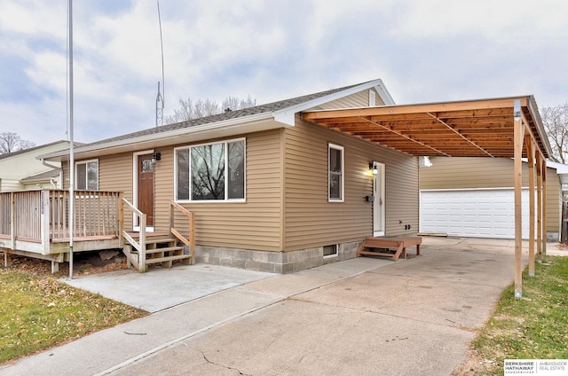 view of front of house featuring a carport