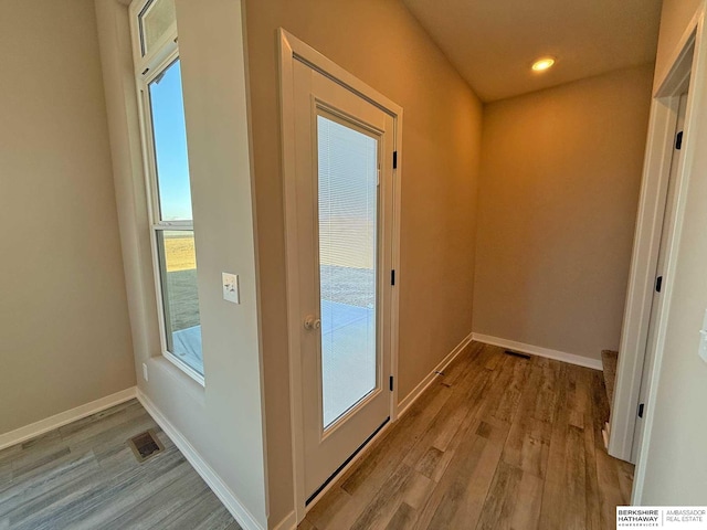 hallway featuring light wood-type flooring