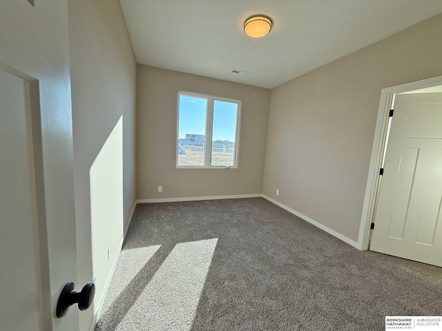 view of carpeted spare room