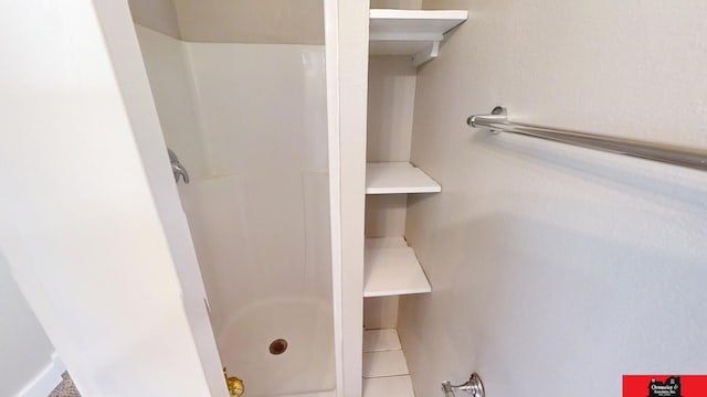bathroom with walk in shower