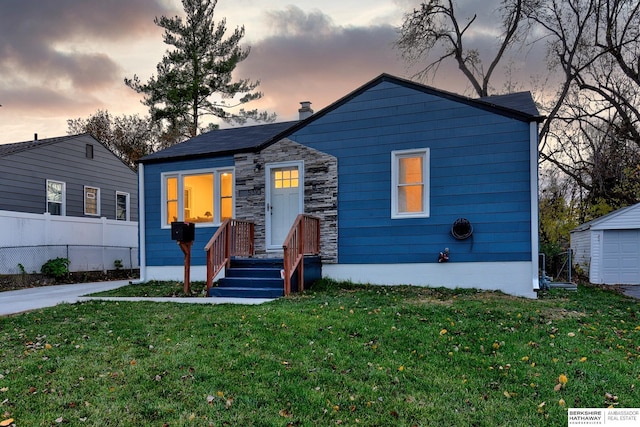 view of front of home featuring a yard