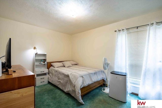 carpeted bedroom featuring a textured ceiling