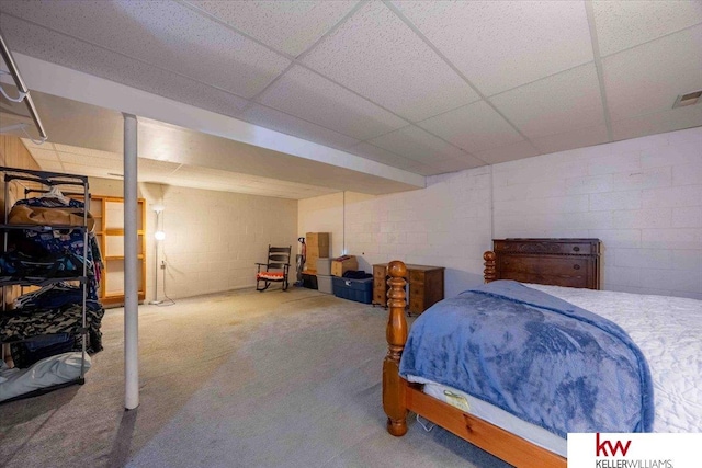 bedroom featuring a drop ceiling