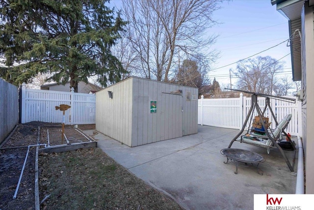 view of outdoor structure with an outdoor fire pit