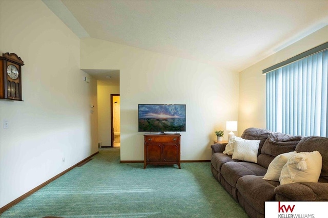 living room with light colored carpet and vaulted ceiling