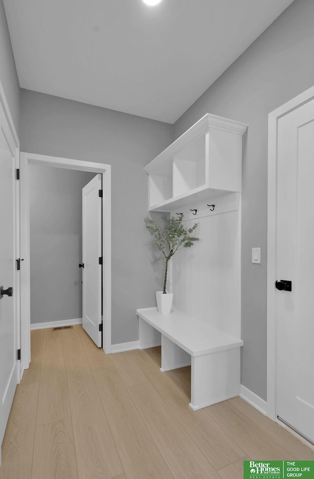 mudroom with light wood-type flooring