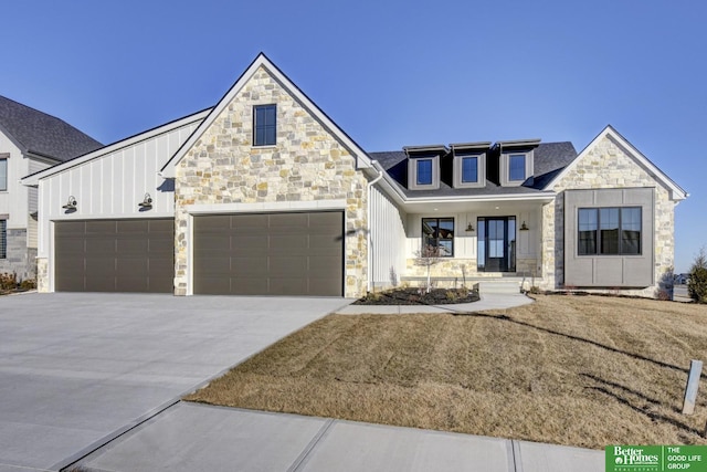 modern farmhouse style home with a porch and a garage