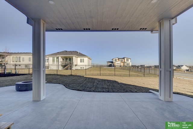 view of patio with an outdoor fire pit