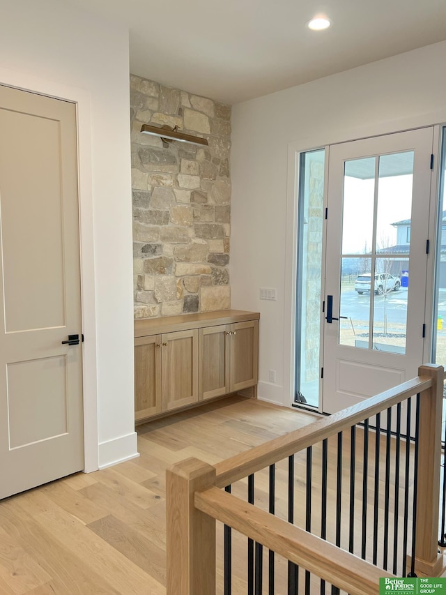 interior space with hardwood / wood-style flooring