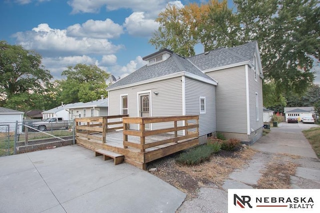 exterior space featuring a wooden deck