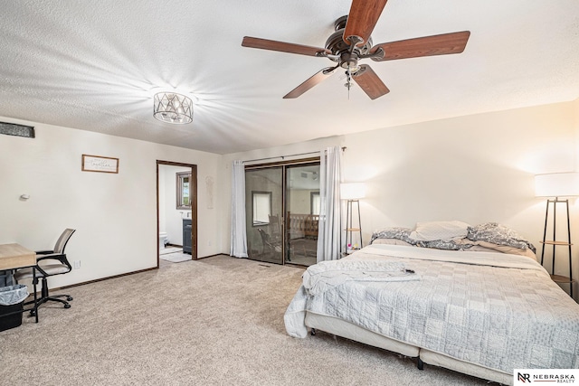 carpeted bedroom with ceiling fan, a textured ceiling, and access to outside