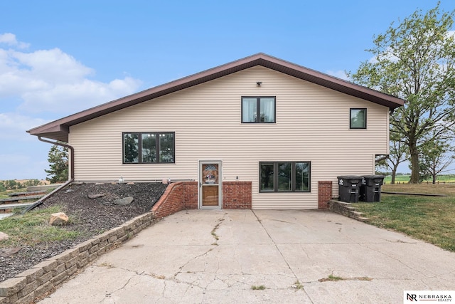 rear view of property with a patio area