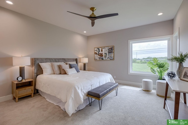 carpeted bedroom with ceiling fan