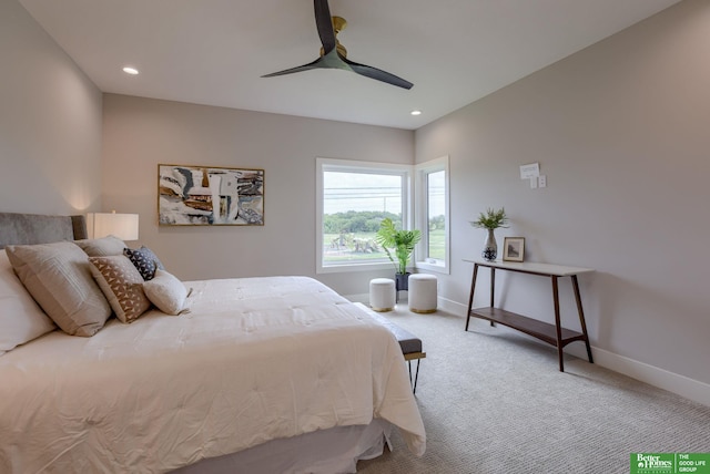 carpeted bedroom with ceiling fan