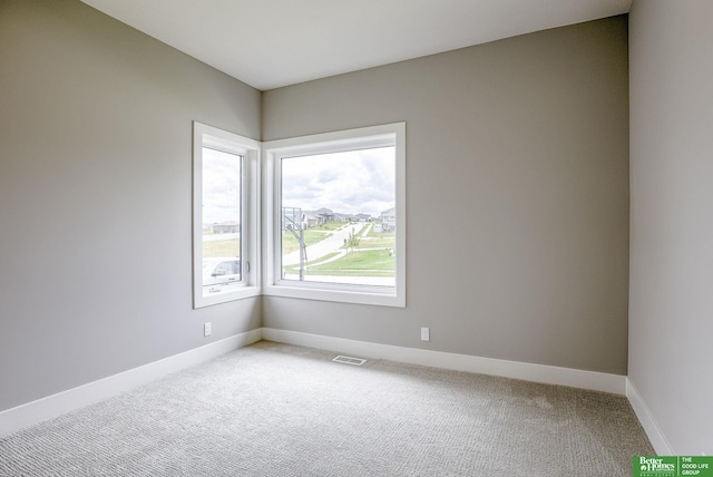 view of carpeted spare room