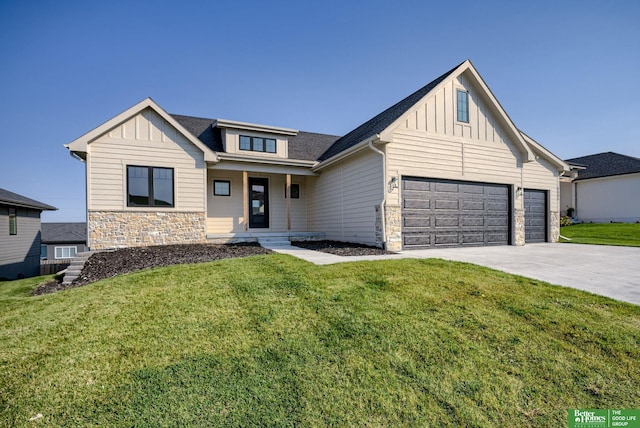 view of front of property with a porch, a garage, and a front lawn