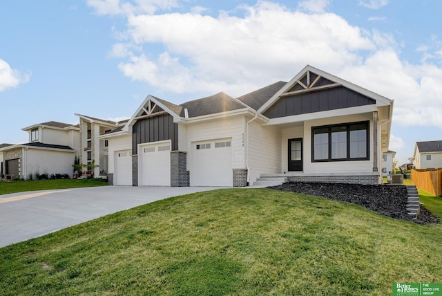 view of front of house featuring a garage and a front lawn