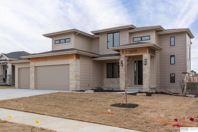 prairie-style house featuring a garage