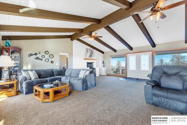 carpeted living room featuring beamed ceiling, high vaulted ceiling, and ceiling fan