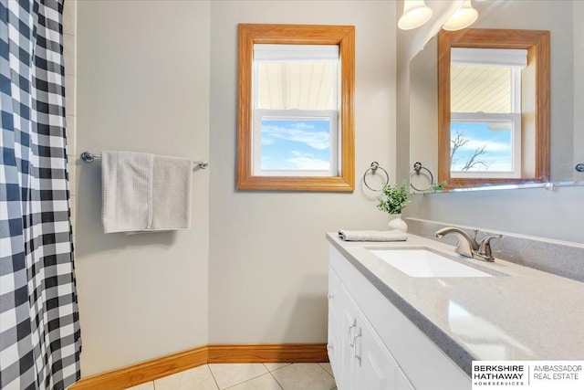 bathroom featuring tile patterned floors and vanity