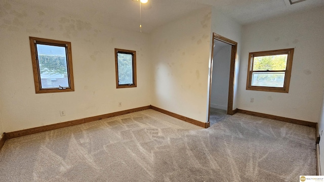 view of carpeted spare room