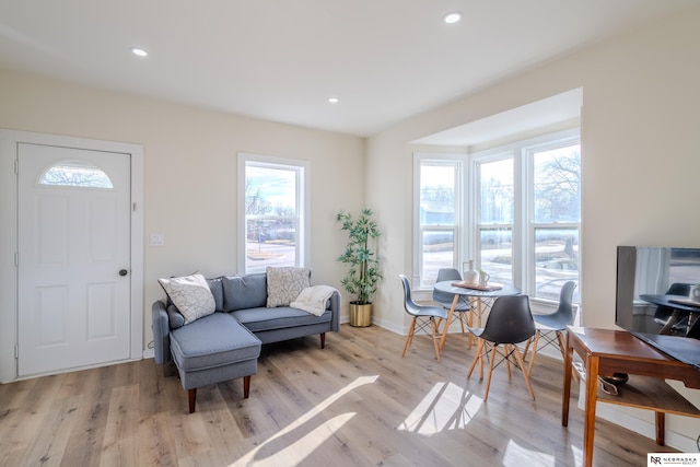 sitting room featuring light hardwood / wood-style flooring