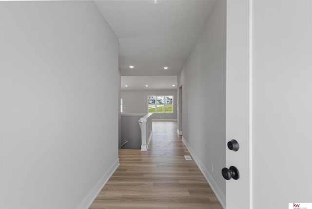 hallway featuring light hardwood / wood-style flooring