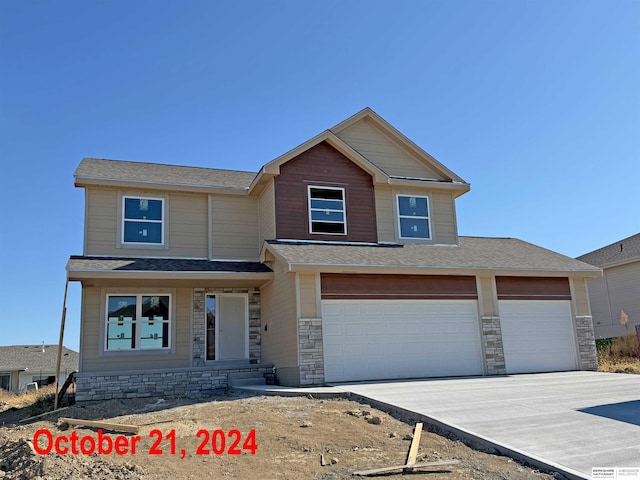 view of front of property featuring a garage