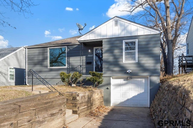 view of front of home with a garage