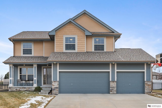 craftsman house with a porch and a garage