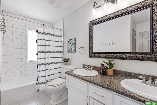 full bathroom with tile patterned flooring, vanity, shower / tub combo with curtain, and toilet